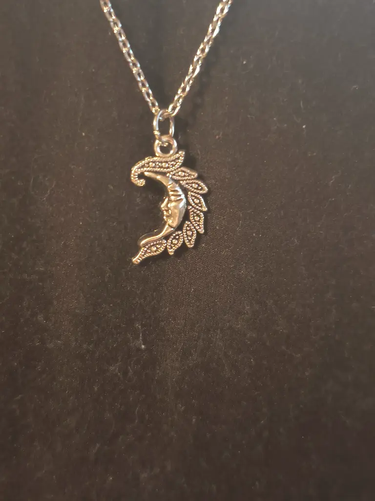 Man in the Half Moon Necklace